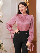 Modely Mock Neck Knot Cuff Lantern Sleeve Satin Top